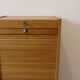 Filing cabinet with curtain