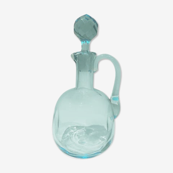 Blue carafe with vintage button