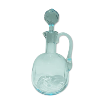 Blue carafe with vintage button