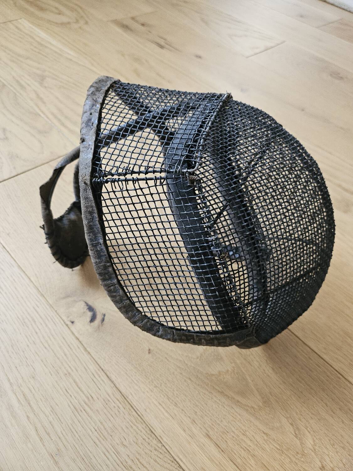 Antique fencing helmet