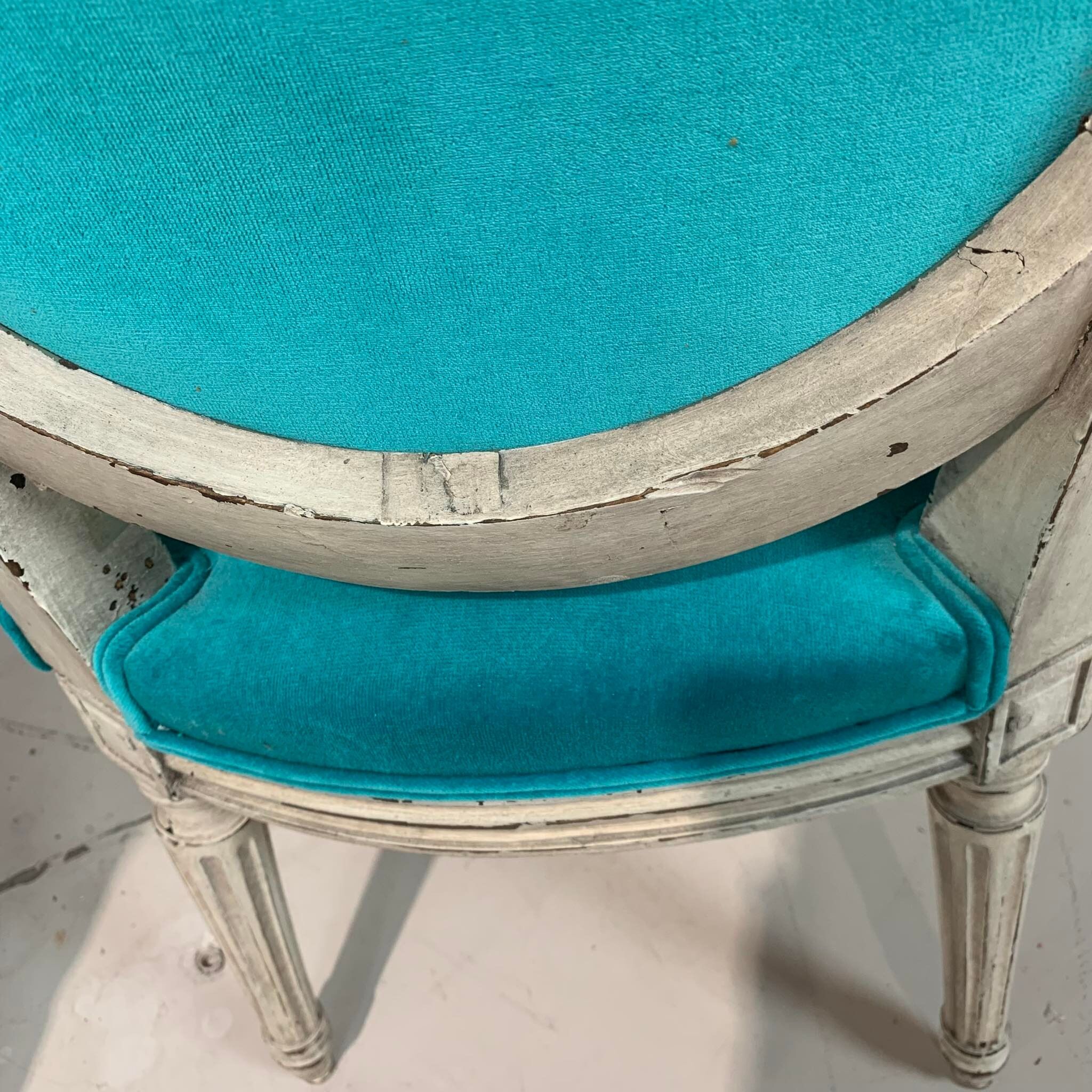 Pair of Louis XVI convertible armchairs