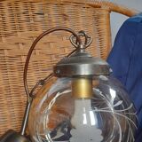 Vintage globe suspension in amber glass, chiseled floral decoration - 80s