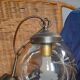 Vintage globe suspension in amber glass, chiseled floral decoration - 80s
