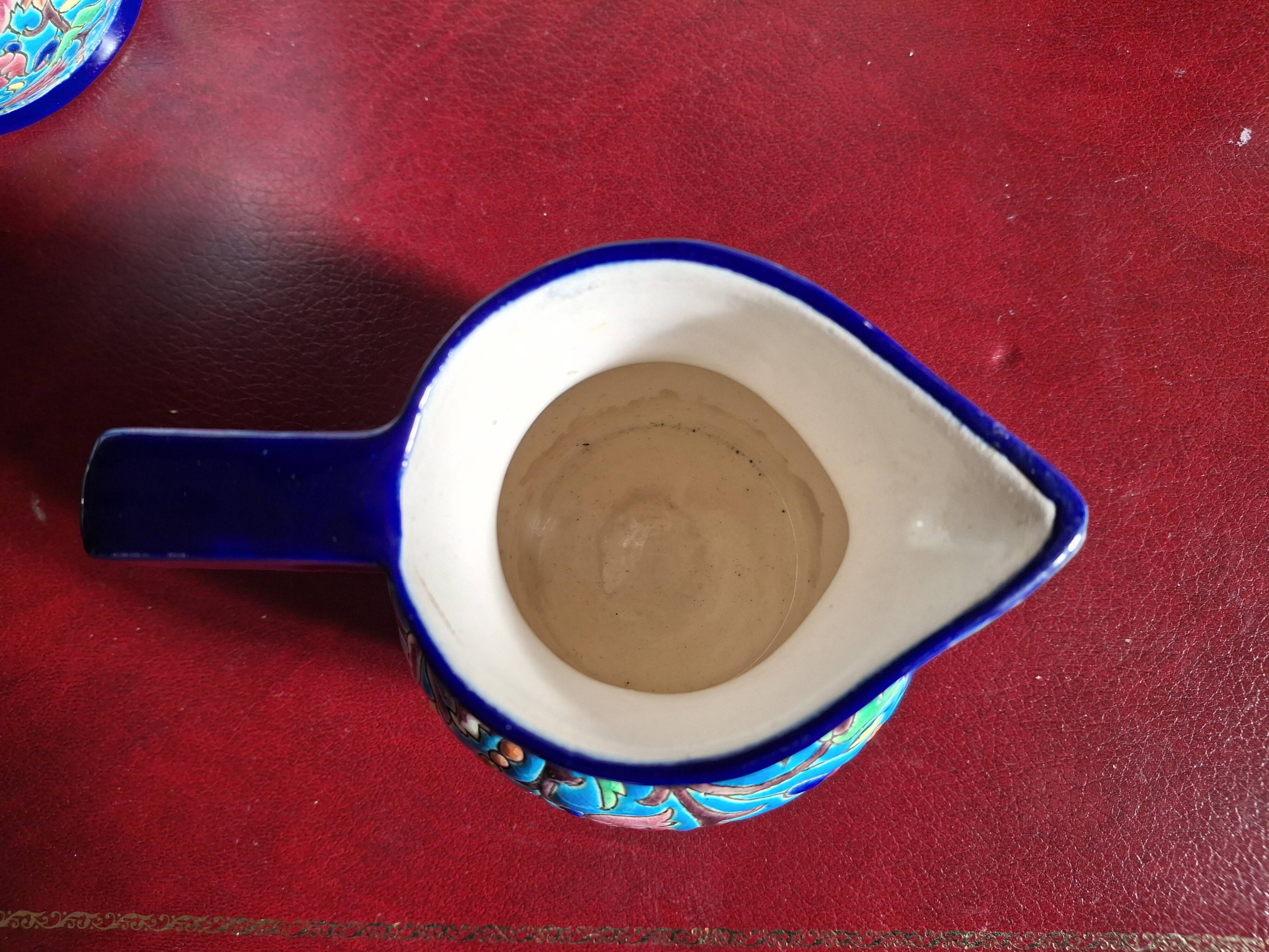 Cloisonné enamel tea service from Longwy in excellent condition.