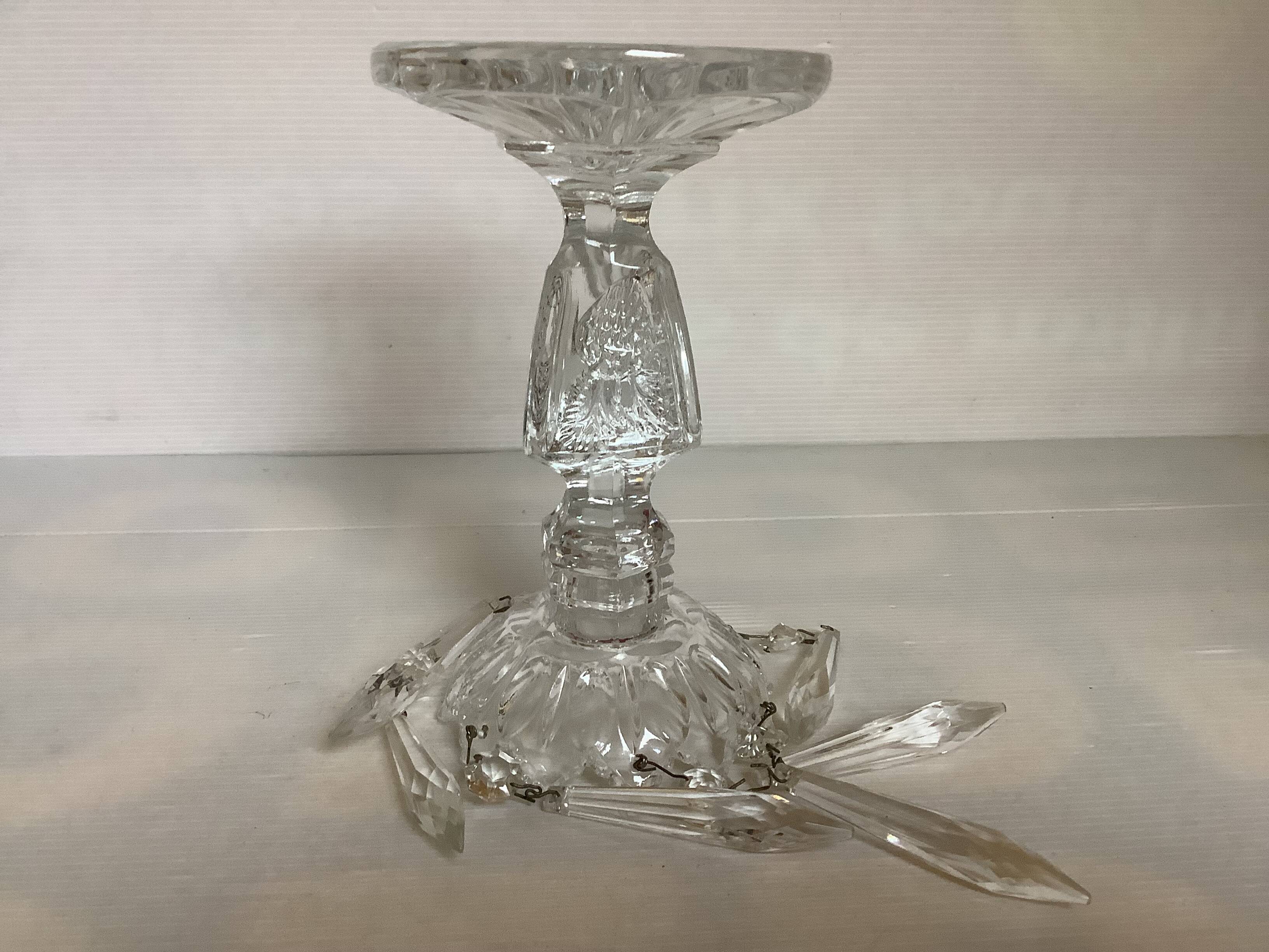 Pineapple candlestick with six glass moulded pendants.