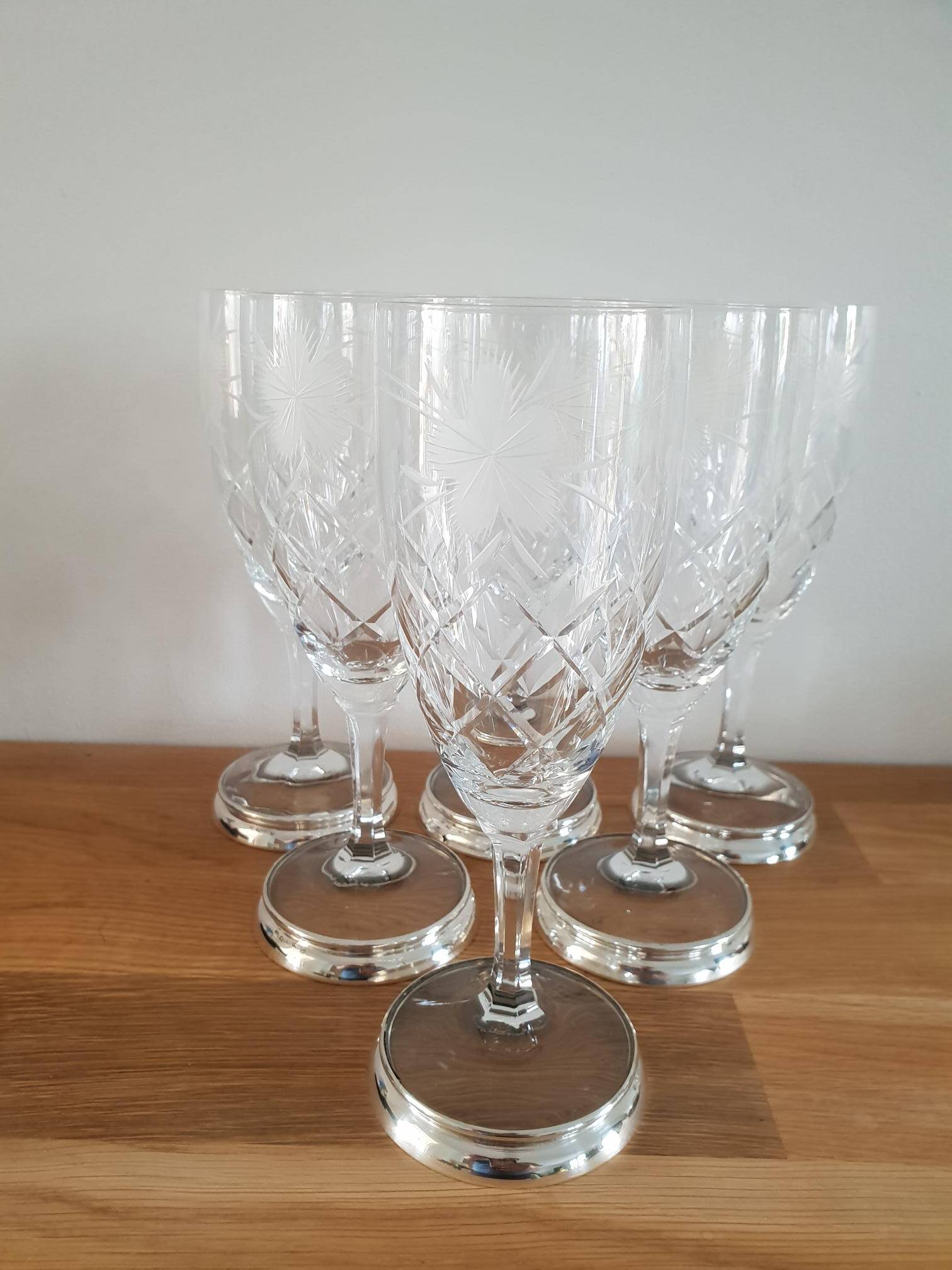Crystal flutes with a silver rimmed foot