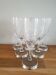 Crystal flutes with a silver rimmed foot