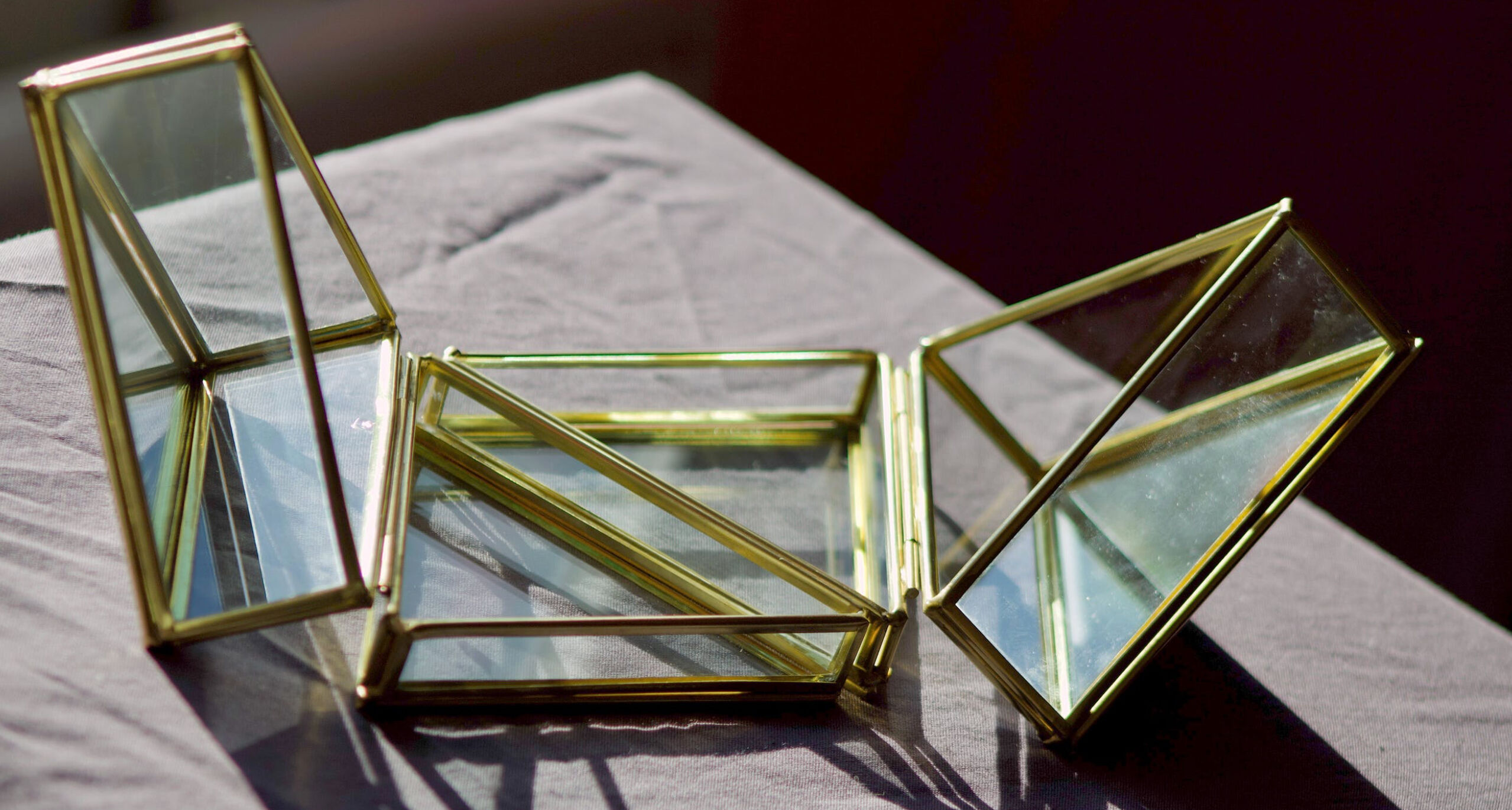 4 old glass, brass and mirror jewellery boxes