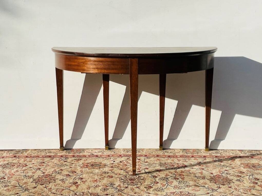 Empire-style demi-lune console from the 19th century.