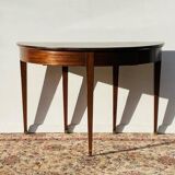 Empire-style demi-lune console from the 19th century.