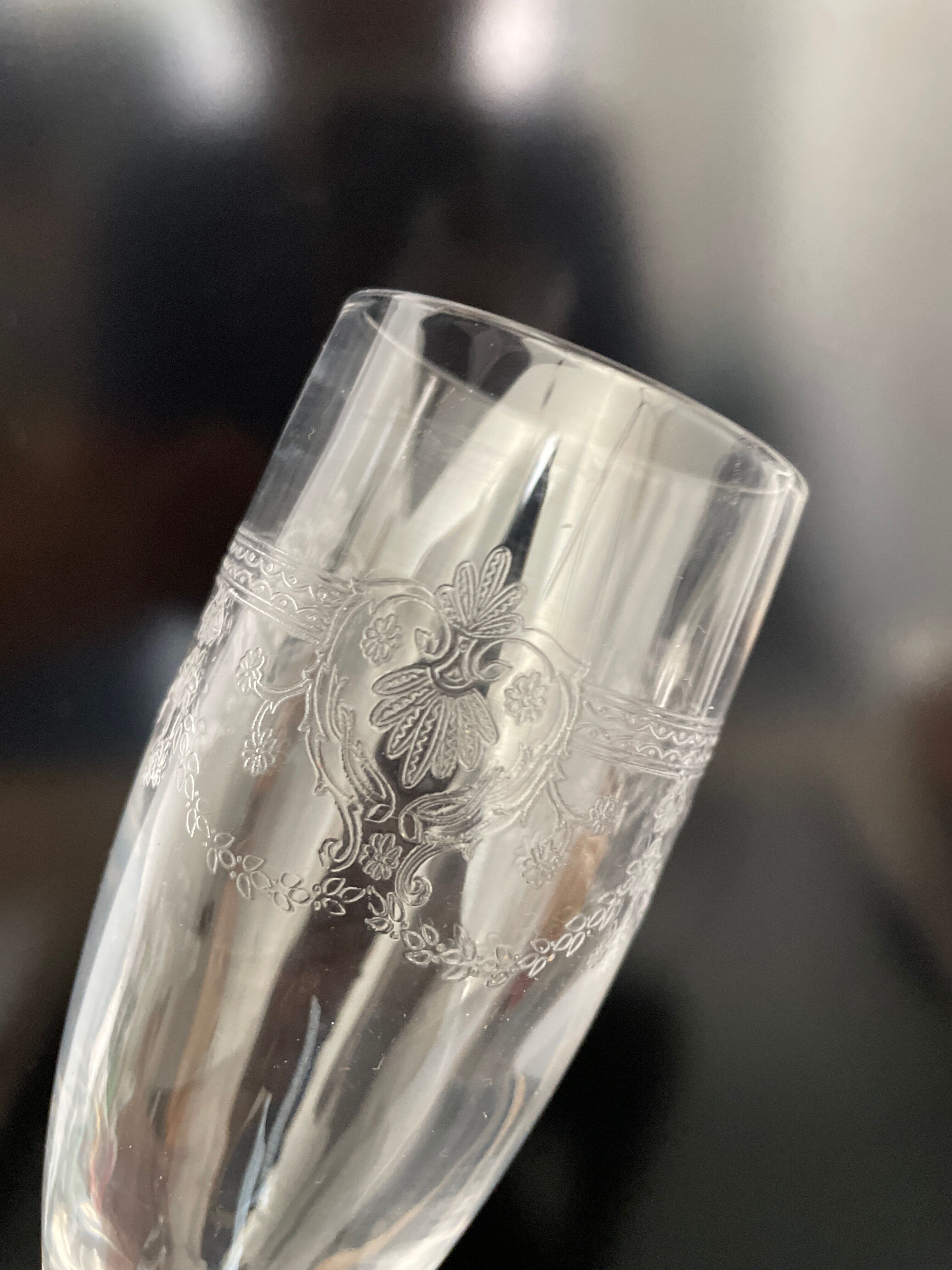 Set of 10 antique champagne glasses in engraved crystal