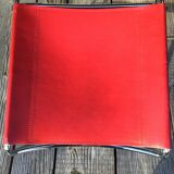 Chrome sled chair and red leather