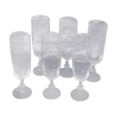 6 chiseled champagne flutes made of transparent glass