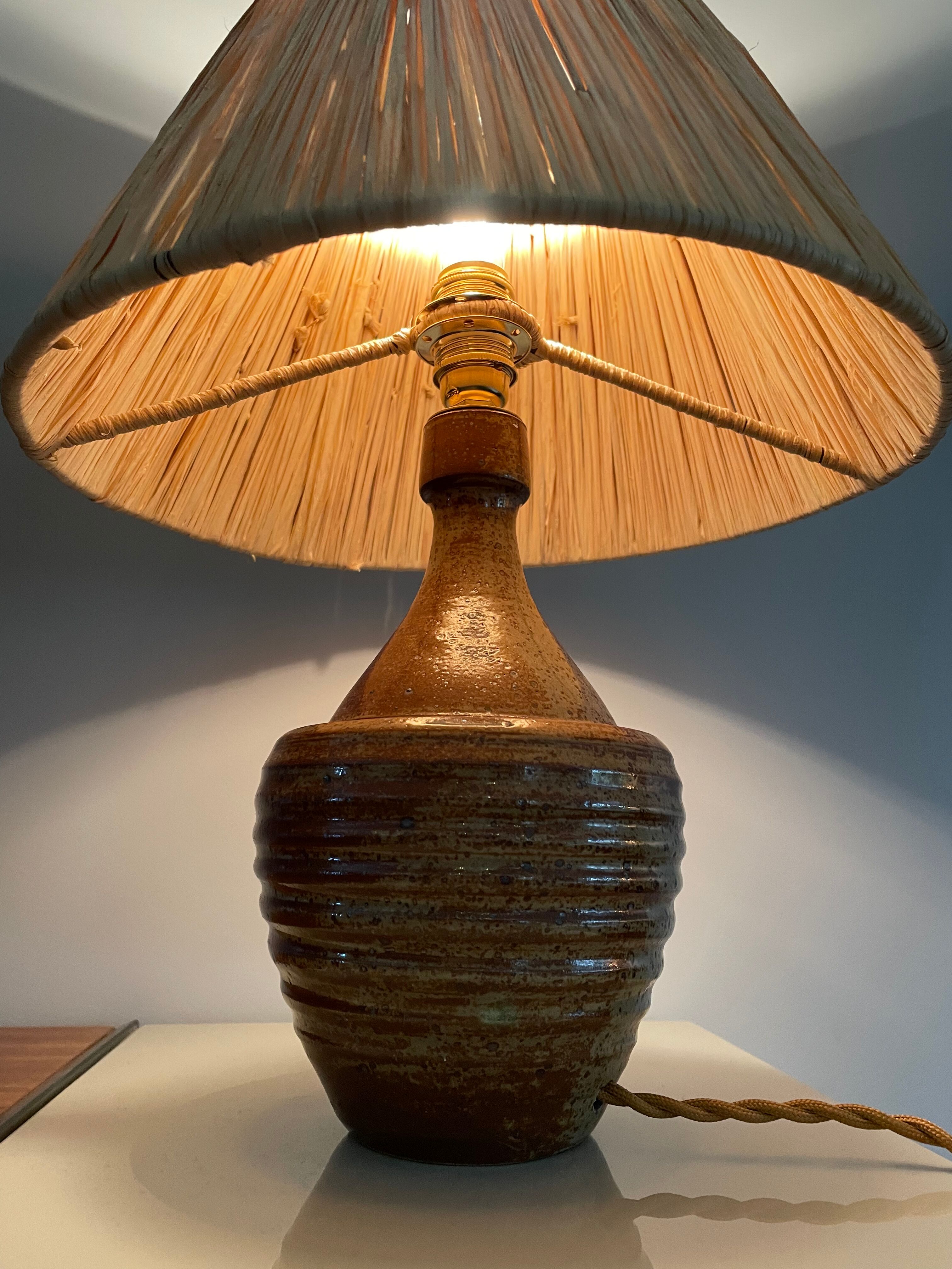 Sandstone lamp and raffia