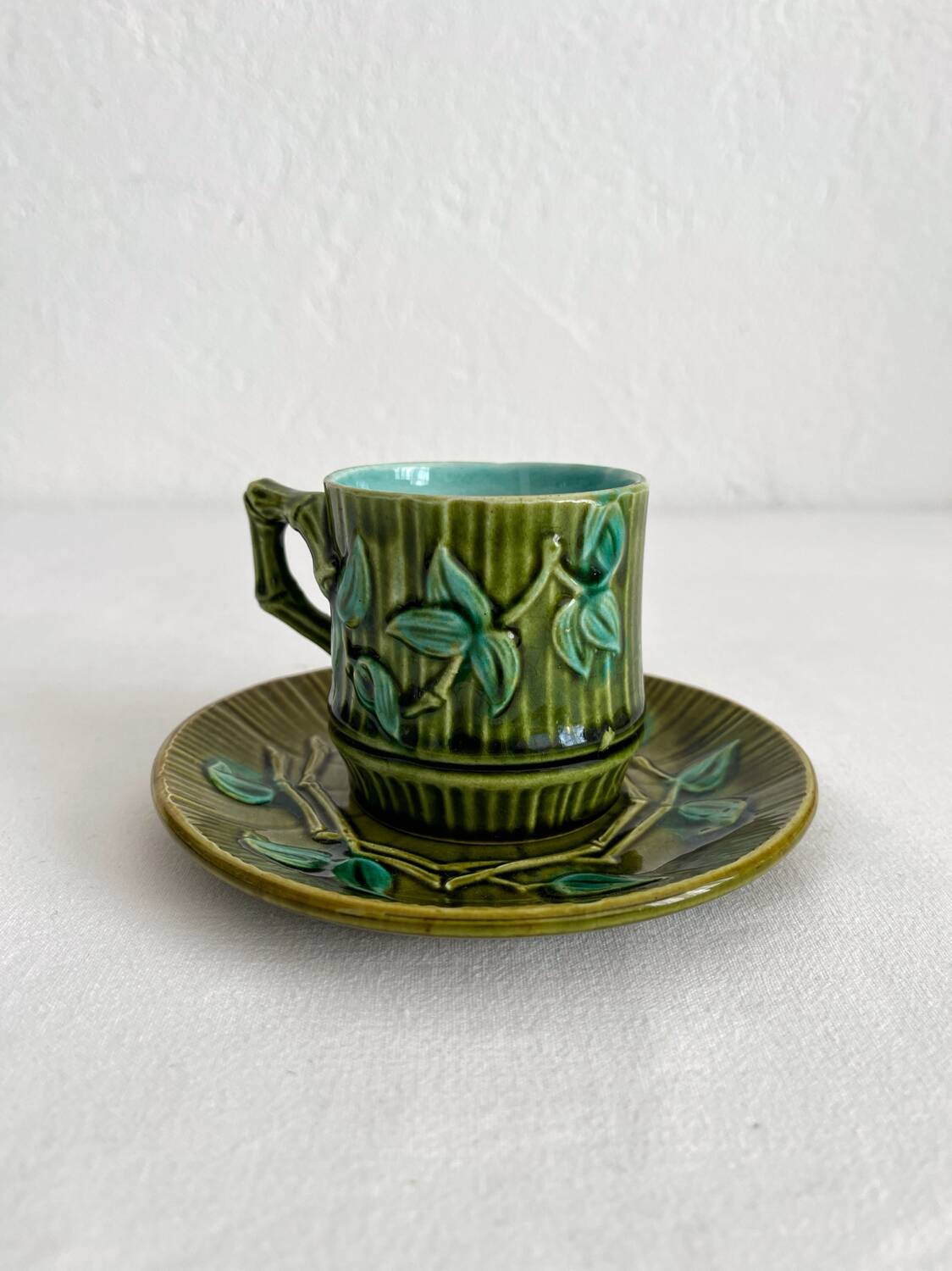 Antique earthenware coffee cup in bamboo slip