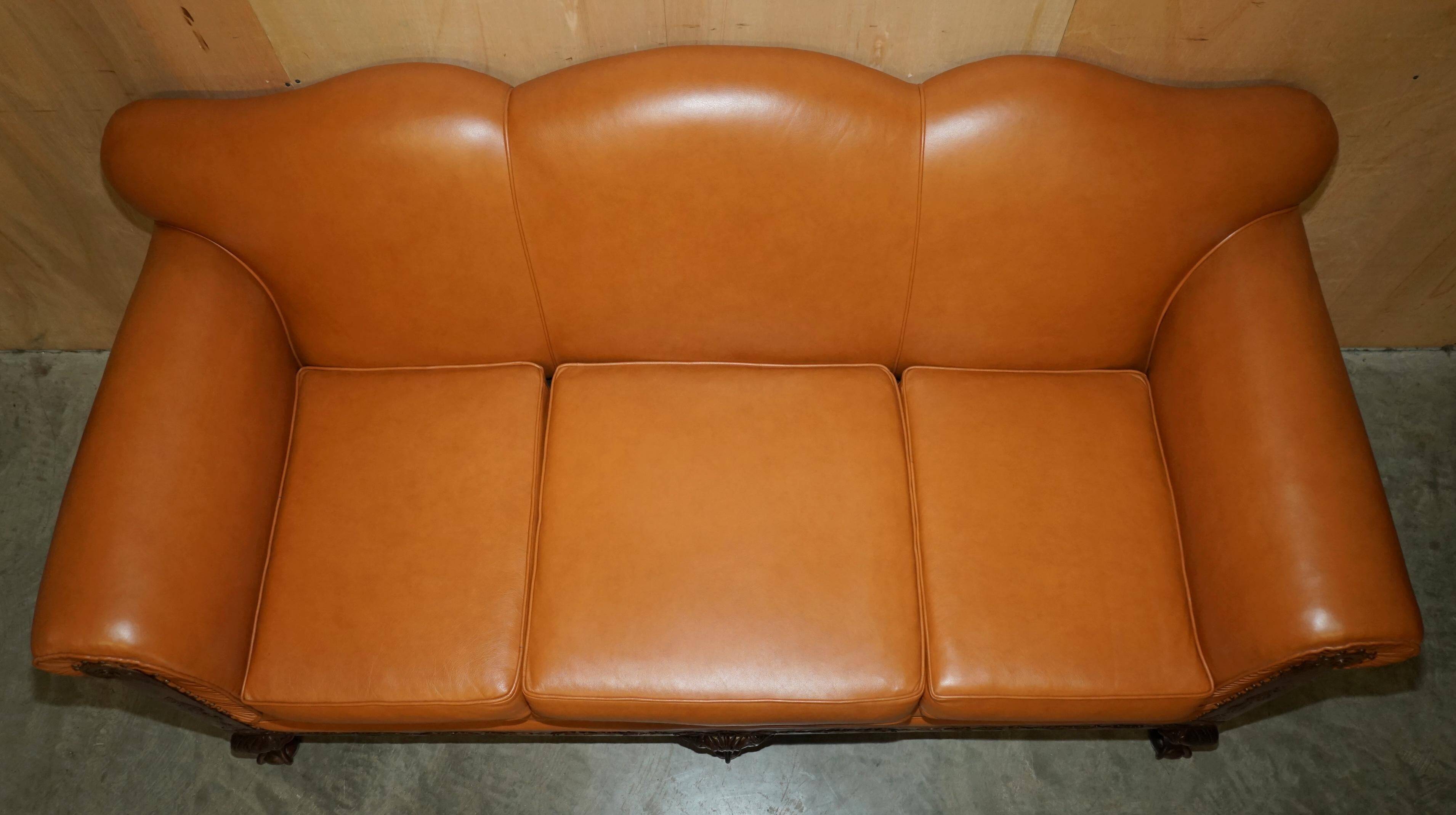 Restored three-seater leather canapé in late Victorian style.