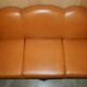 Restored three-seater leather canapé in late Victorian style.