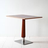 Mahogany bar table with steel base and carved stem
