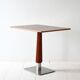 Mahogany bar table with steel base and carved stem