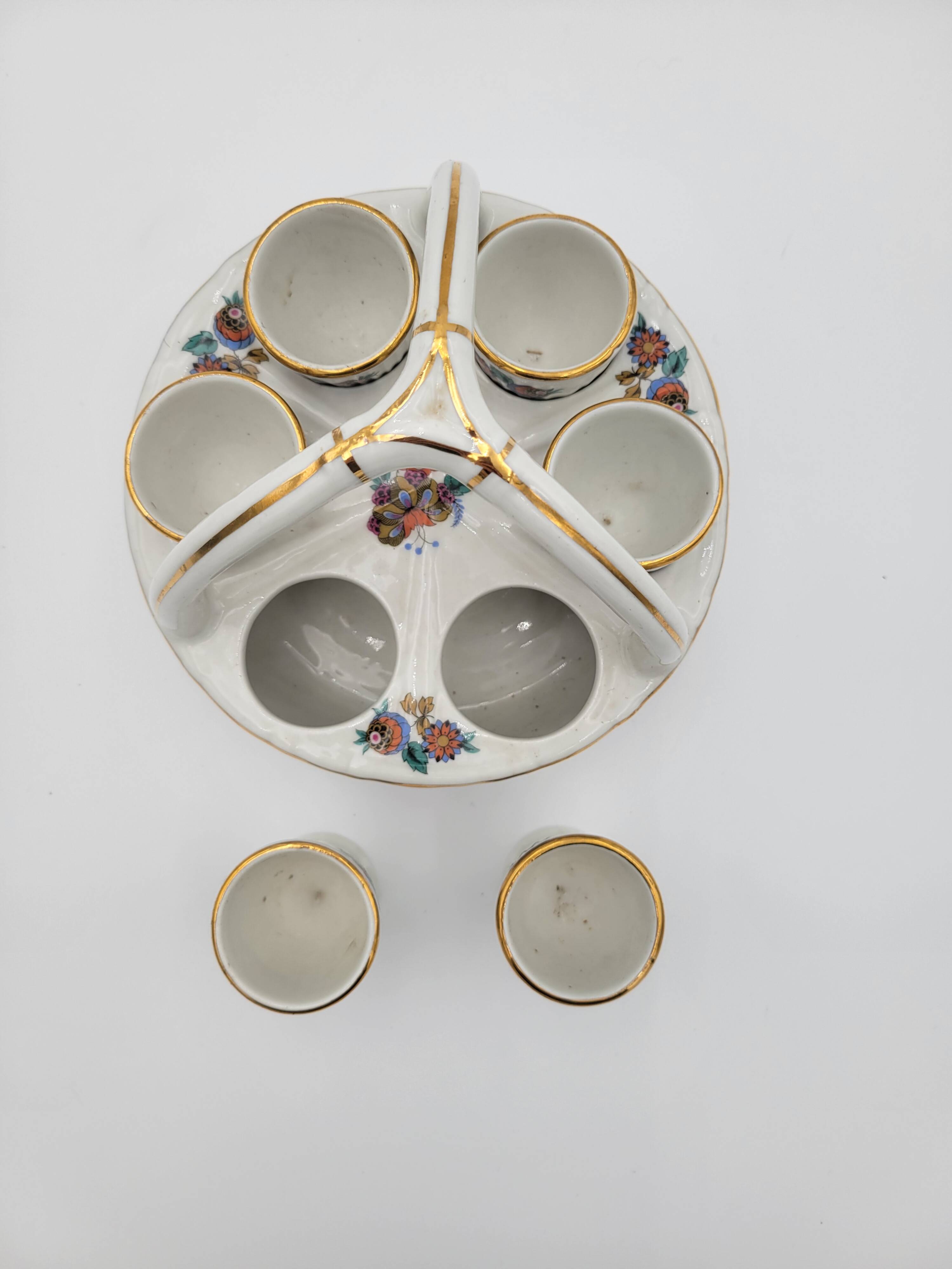 Porcelain egg dish basket with polychrome floral decoration