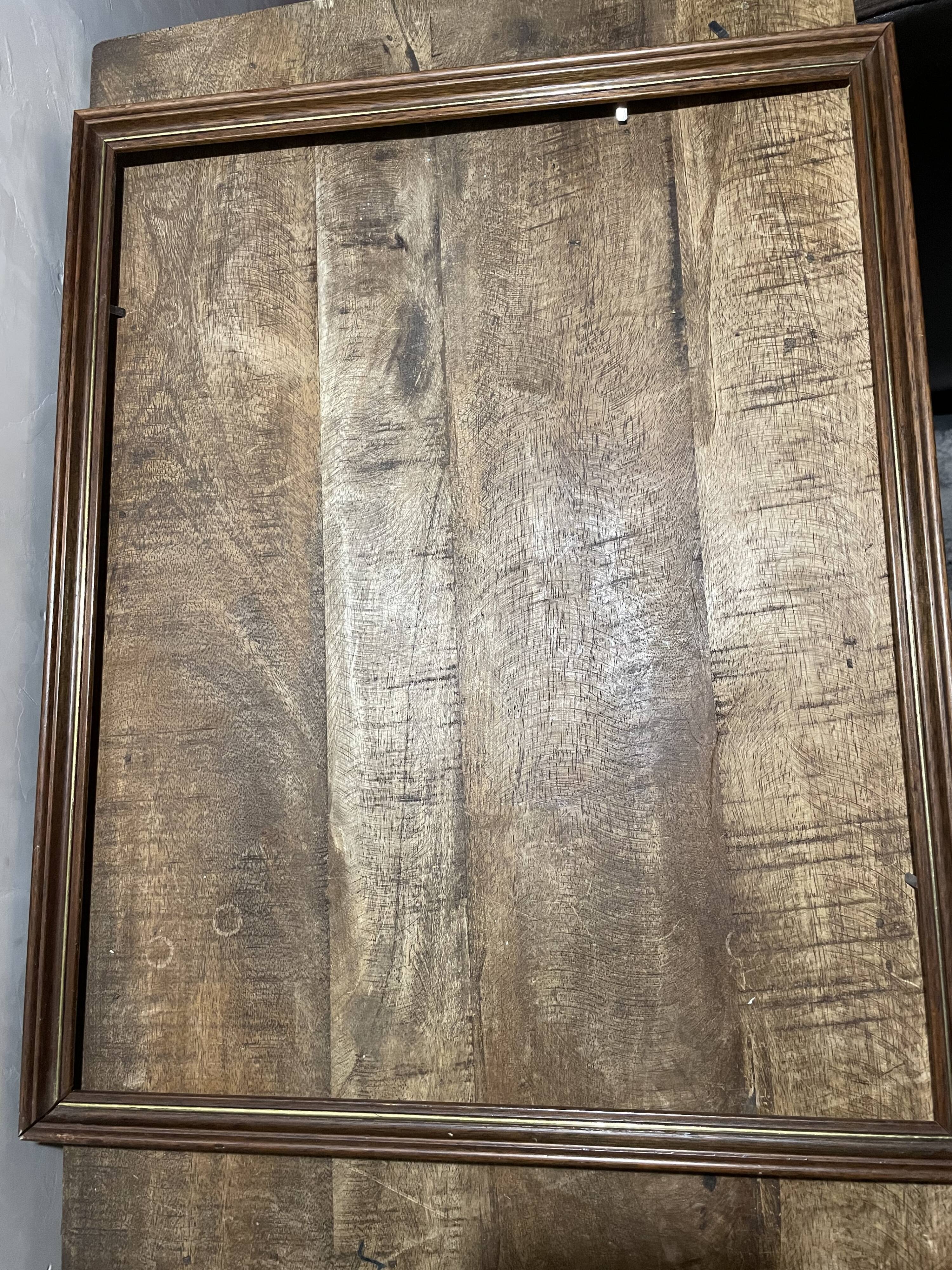 Large wooden frame with gilded outline