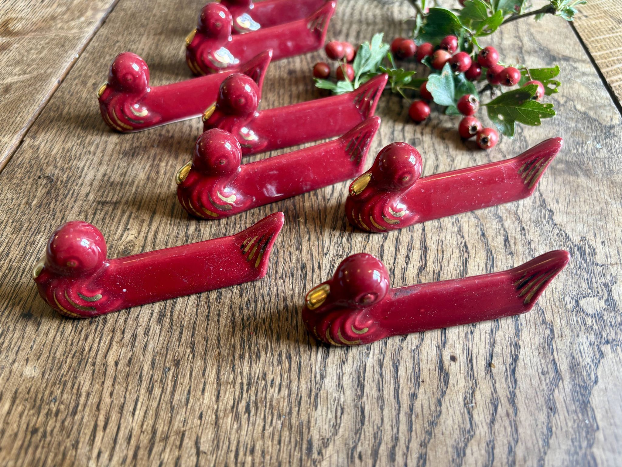 Set of 8 vintage slip knife holders in the shape of red ducks and