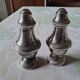 Salt and pepper in silver-plated metal.