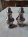 Salt and pepper in silver-plated metal.