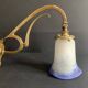 Art Nouveau wall light in gilded brass and glass paste tulip