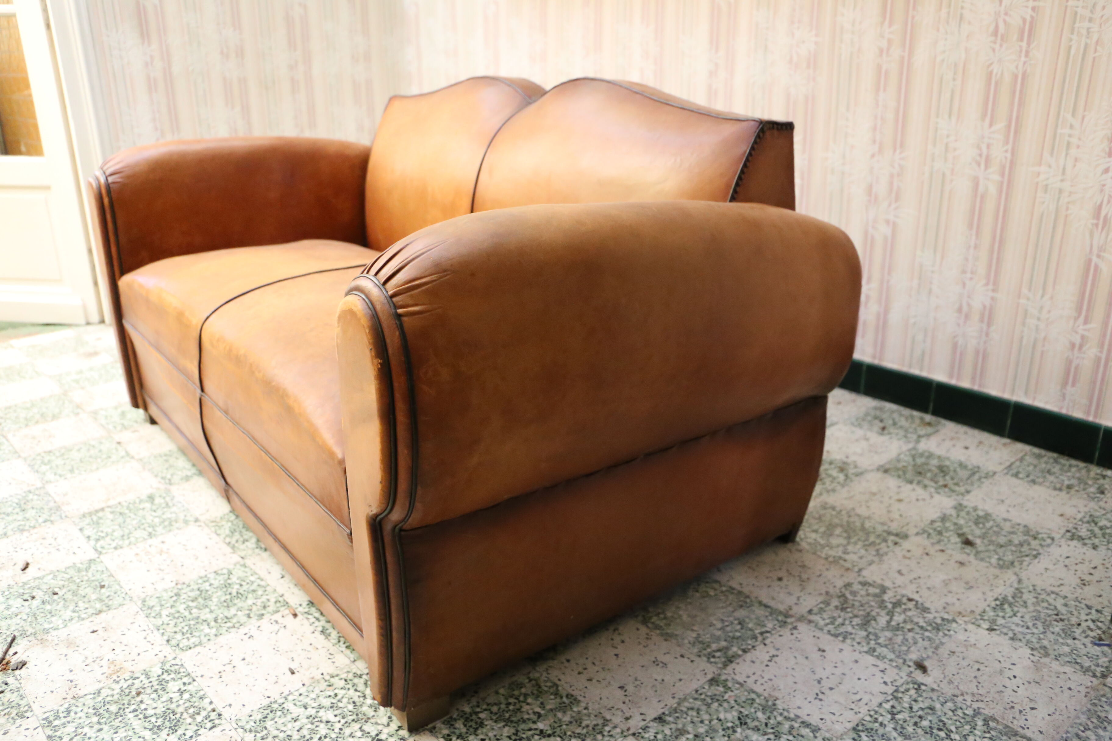 Moustache club sofa in leather, 40s