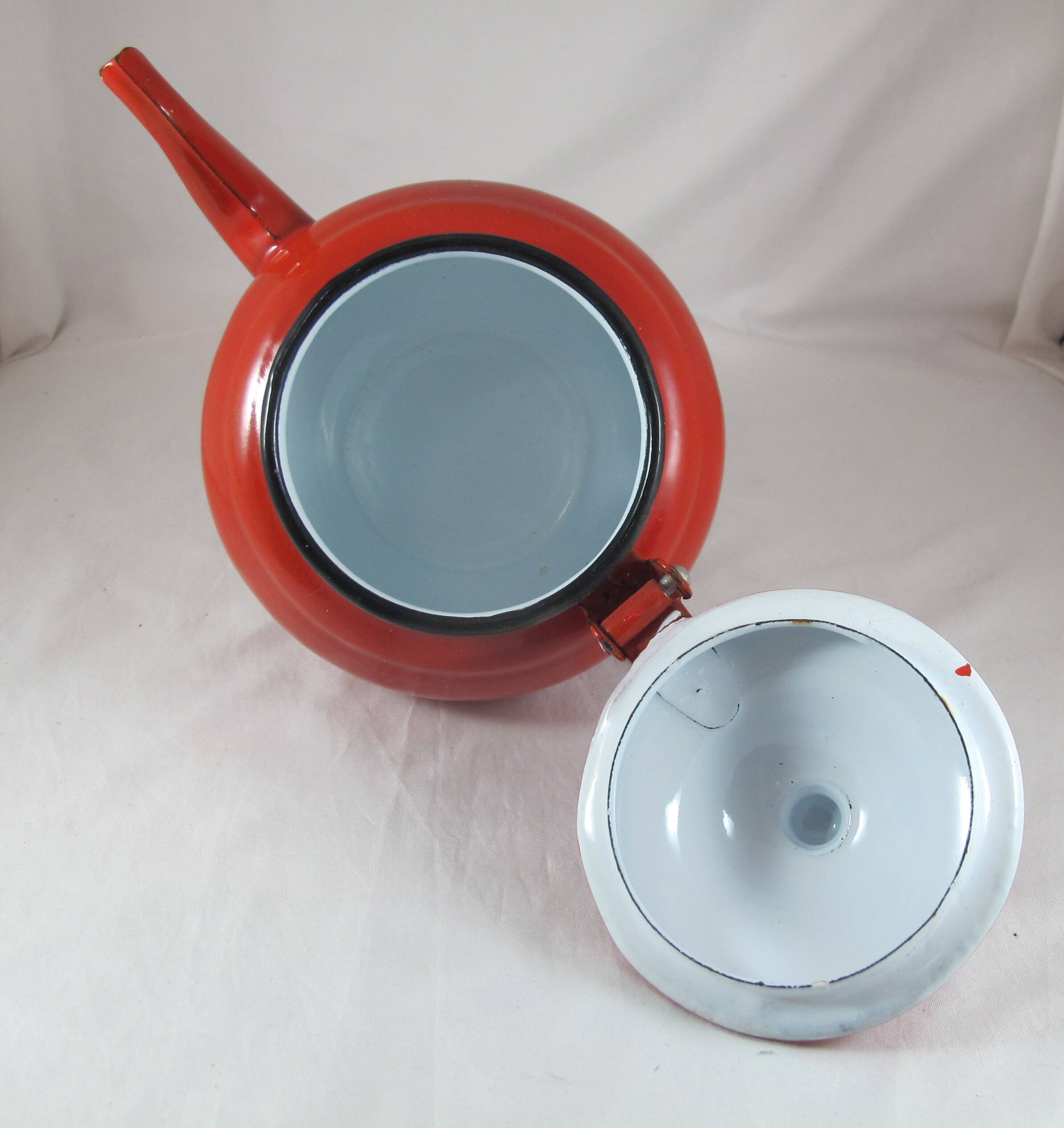 Vintage teapot coffee maker in red enameled metal