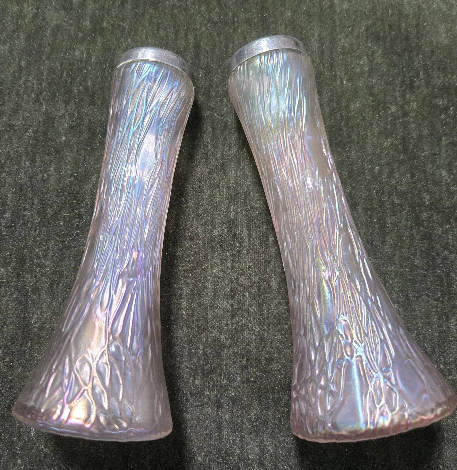 Pair of iridescent glass vases with relief decoration reminiscent of plant motifs.