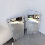 Pair of "Memphis" mirrors from the 80s in chrome and wood.