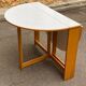 Vintage round folding Scandinavian dining table from the 1970s
