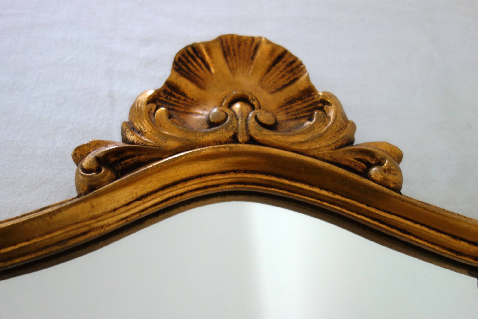 Vintage rocaille or shell gold mirror