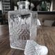 Vintage whiskey decanter in diamond faceted glass airtight stopper