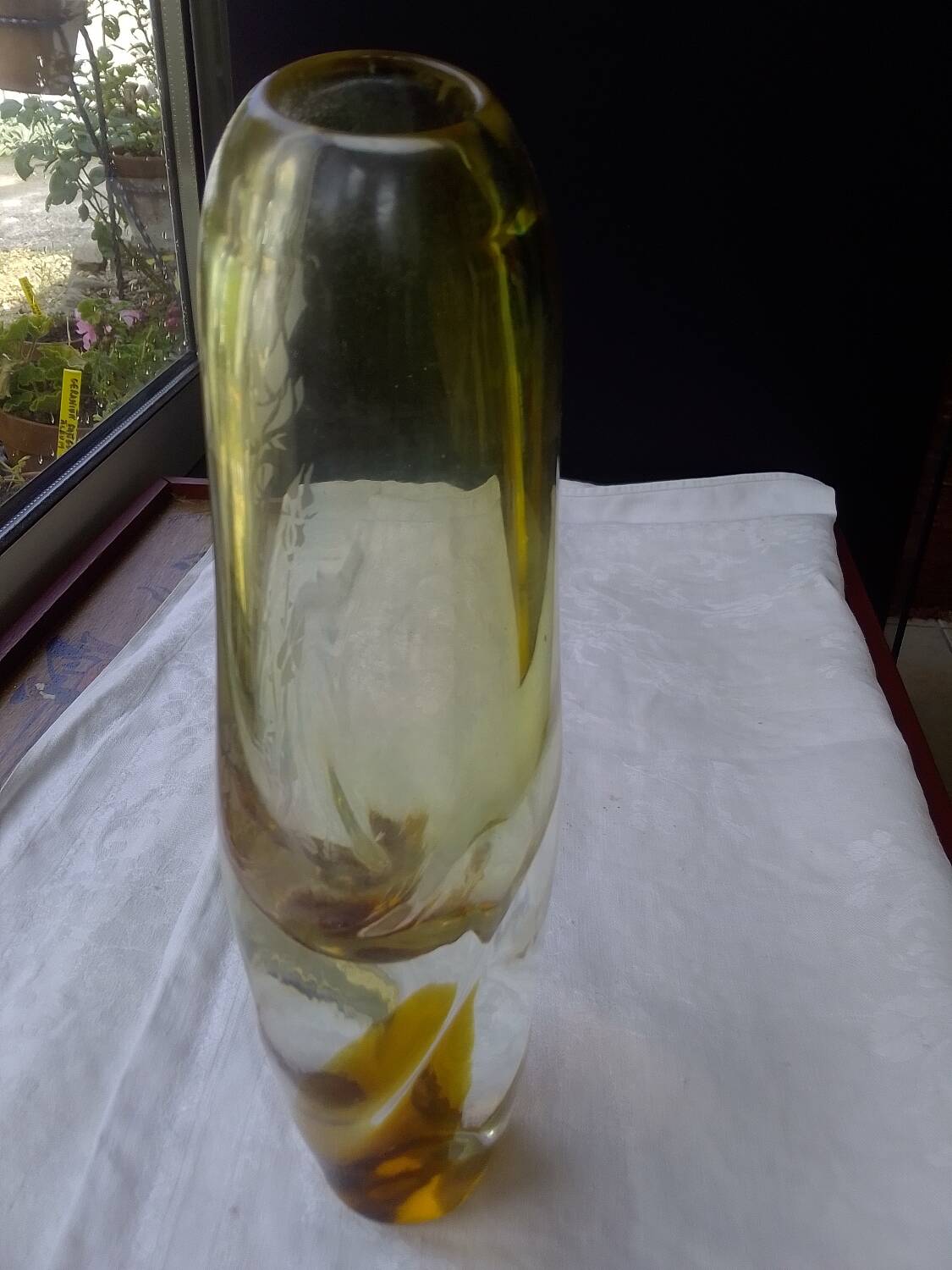 Amber-colored engraved crystal vase