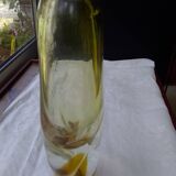 Amber-colored engraved crystal vase