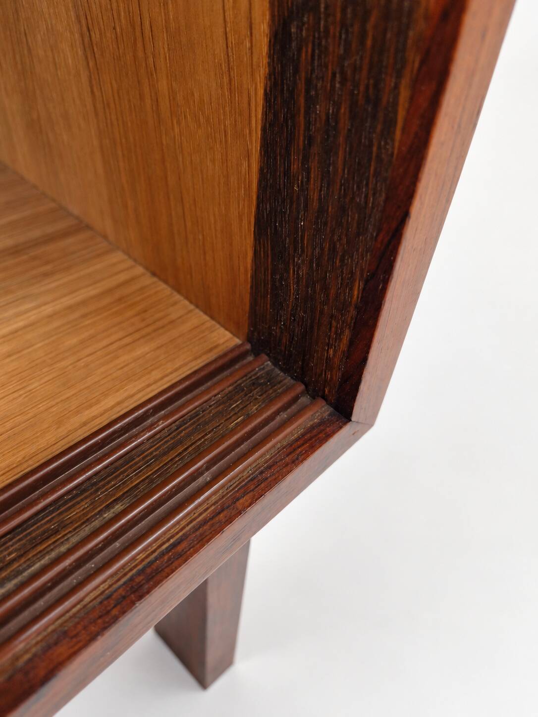 Low sideboard in rosewood with sliding doors. Denmark, 1960s