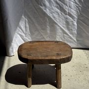Small stool, oval solid teak accent stool with a two-tone seat.