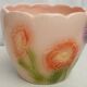Barbotine earthenware planter with poppy flower decor