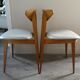Pair of wooden chairs and skai scandinavian style