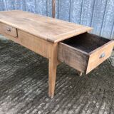 Antique solid cherry farmhouse table with 3 drawers and 1 pull out.