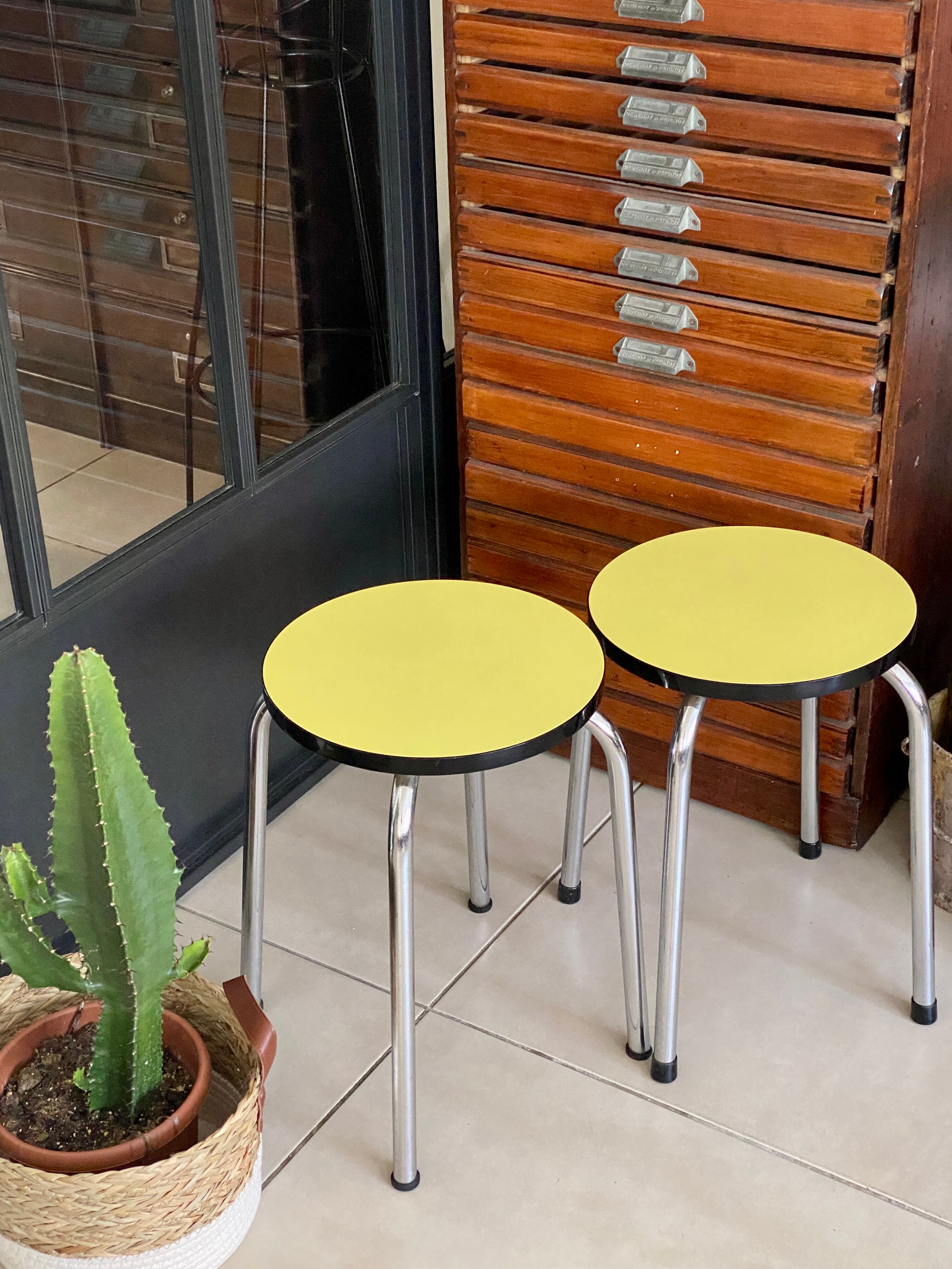 Pair of yellow Formica stools