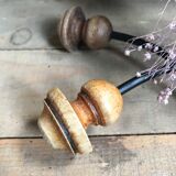 Pair of old wood and metal hooks