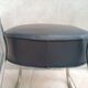 Vintage office chair in chrome metal and faux leather.