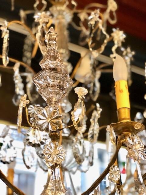 Large chandelier with tassels and old daggers