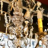 Large chandelier with tassels and old daggers
