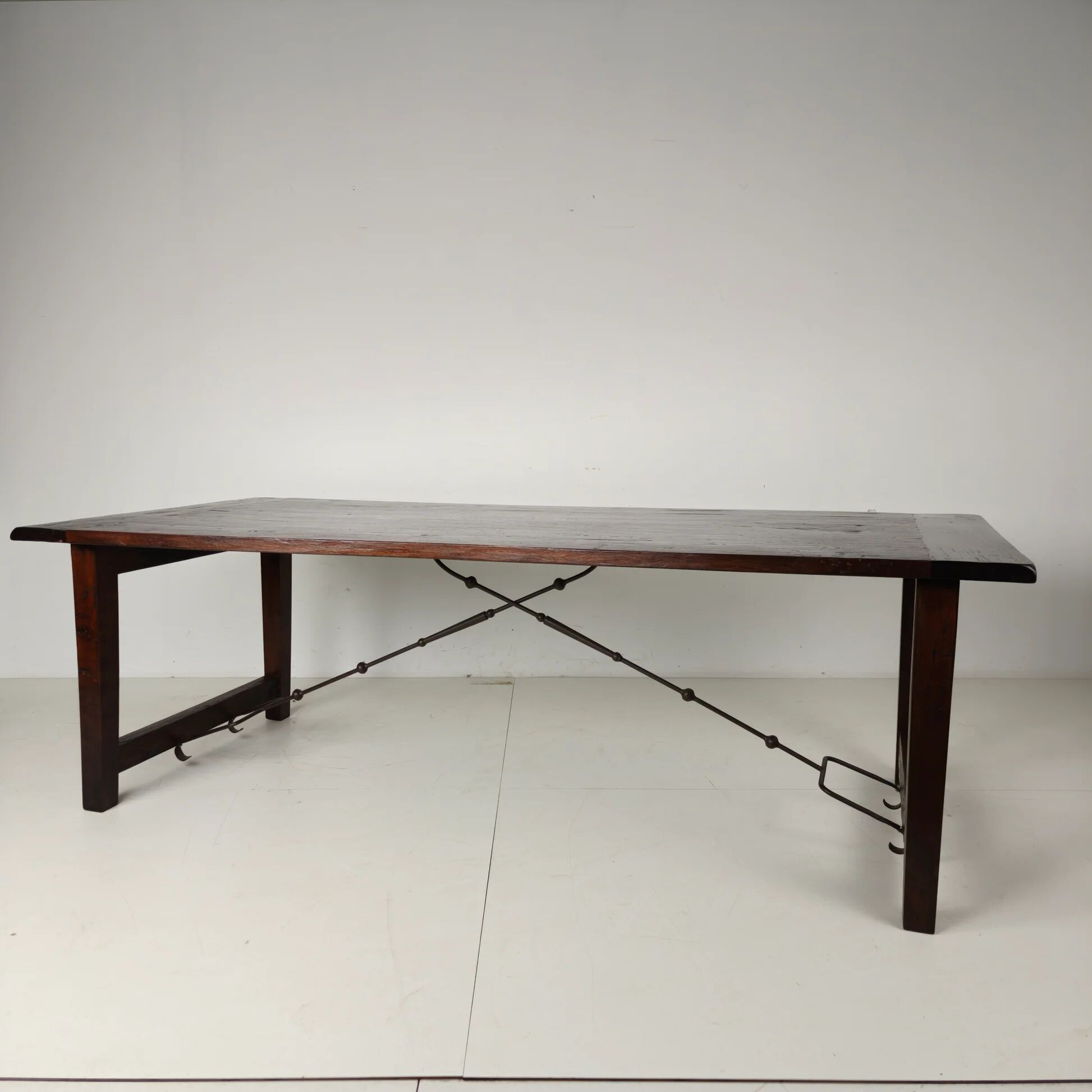 Large Spanish oak dining table with wrought iron bars – 20th century
