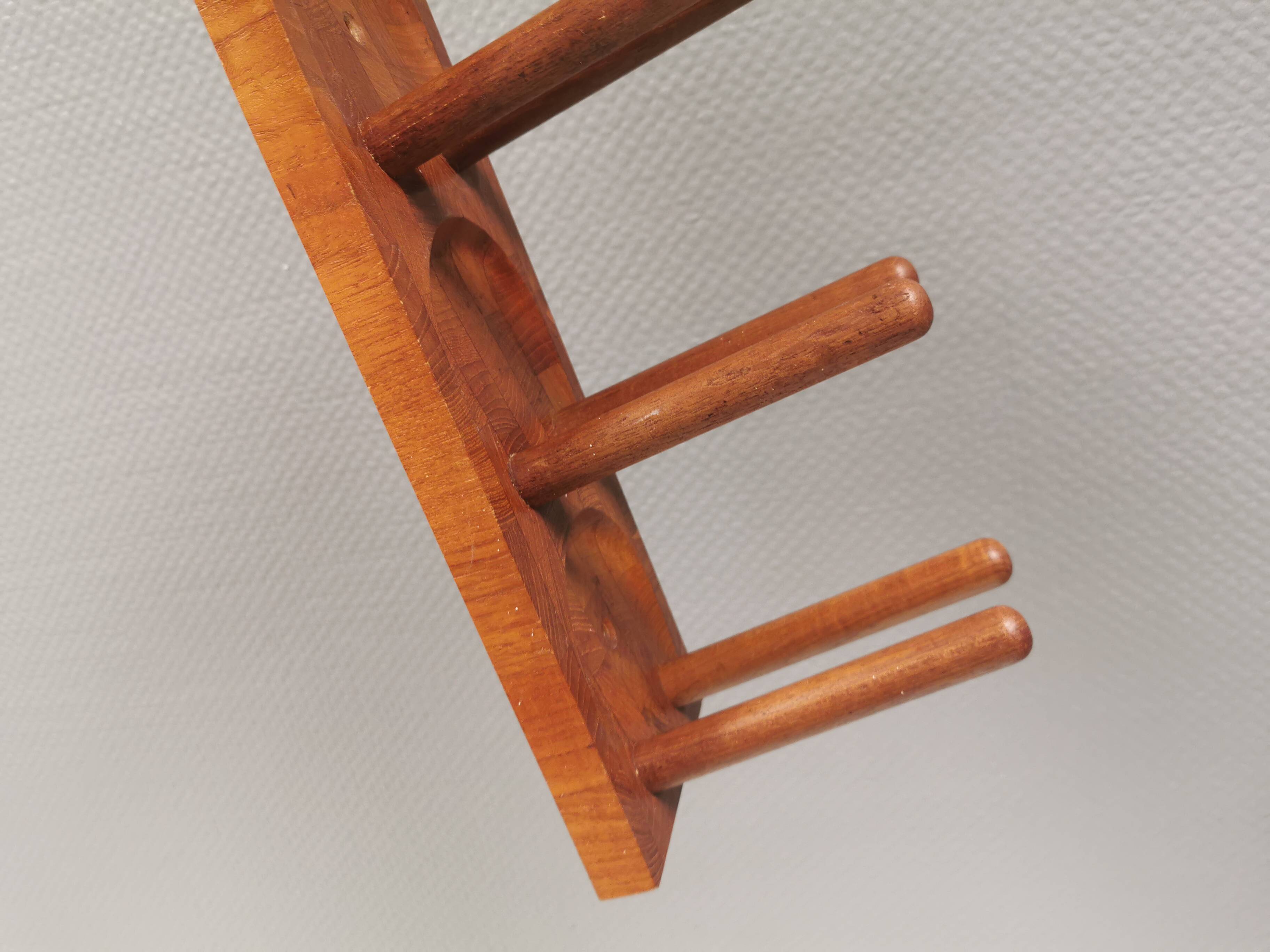 Beautiful Danish wine rack/holder for 3 bottles of wine on the wall. 1980s